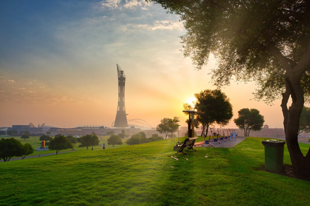 A beautiful and peaceful landscape shot of Aspire Park in Doha, Qatar, which is used in Sky Bird Travel & Tours tour blog about the best places to travel in Qatar.