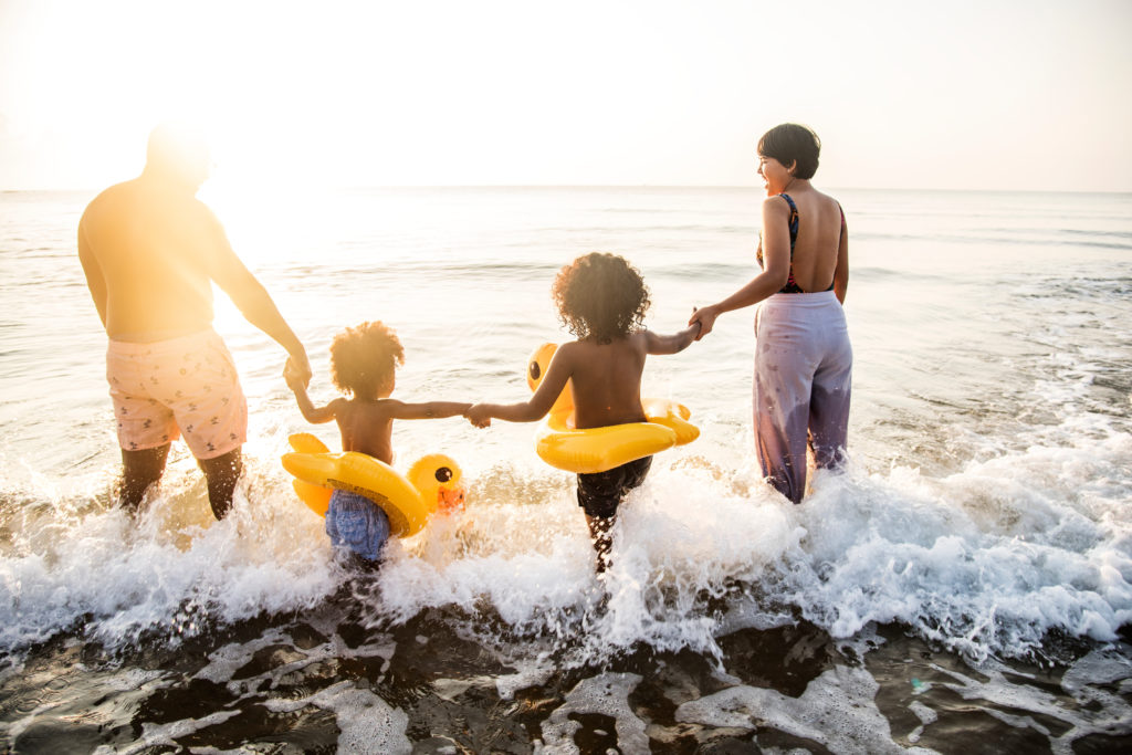 This image is featured in the Sky Bird Travel & Tours blog, "Booking Travel For Clients With Kids," which gives tips for booking family vacations with children.