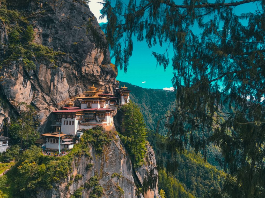 This Image of the Tiger's Nest Taktsang Trail in Bhutan is featured in the Sky Bird Travel & Tours tour blog, best honeymoon destinations, which lists the most romantic locations for newlyweds and couples.