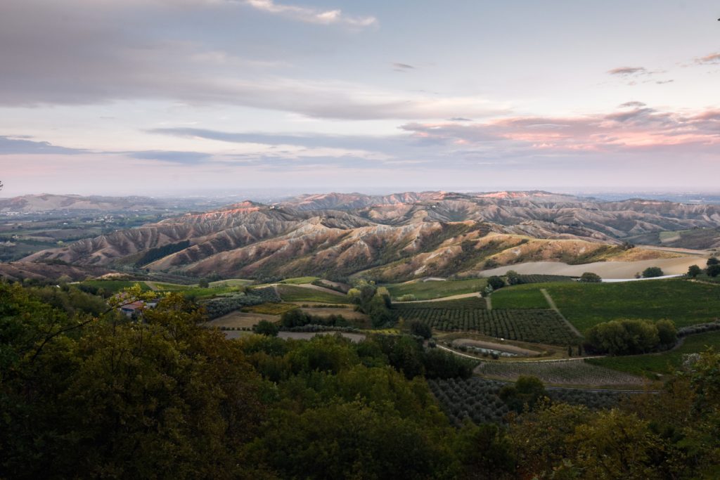 Featured in Europe's Hidden Gems by Sky Bird Travel & Tours, this image of Brisighella, Italy features a beautiful nature landscape of the Italian countryside.