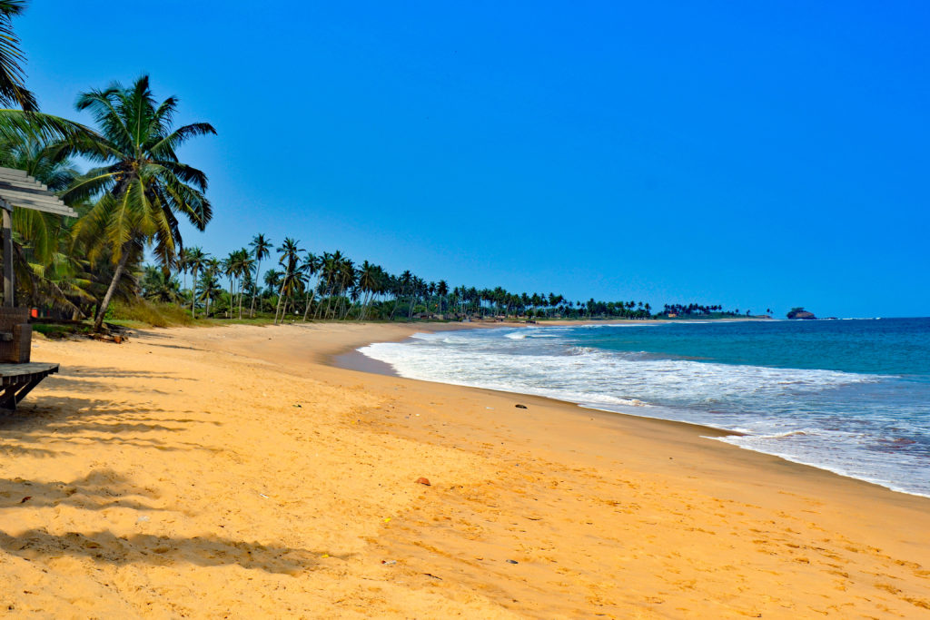 Featured in Top 10 Destination: Ghana by Sky Bird Travel & Tours, this image shows Busua Beach in India.