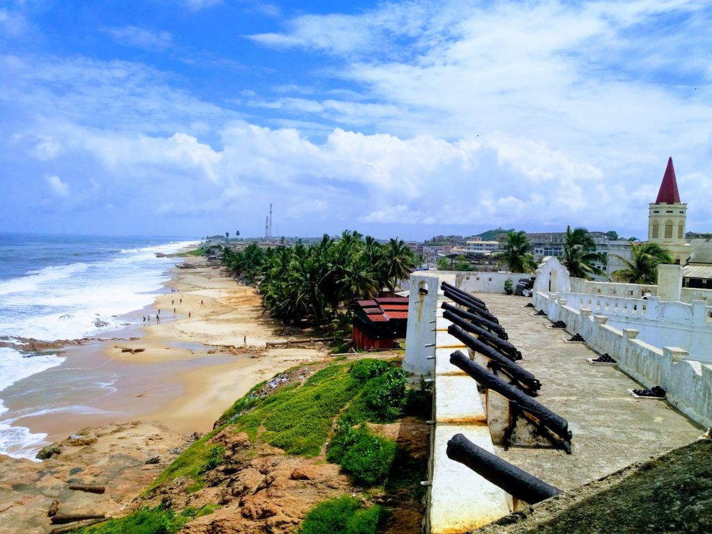 Featured in Top 10 Destination: Ghana by Sky Bird Travel & Tours, this image shows the landscape at the Cape Coast Castle.