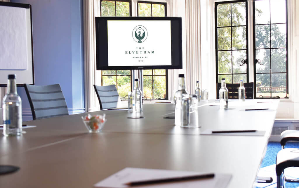 Featured in Sky Bird Travel & Tours blog post "Booking Corporate Retreats," this image shows the business room at the elvetham hotel in england.