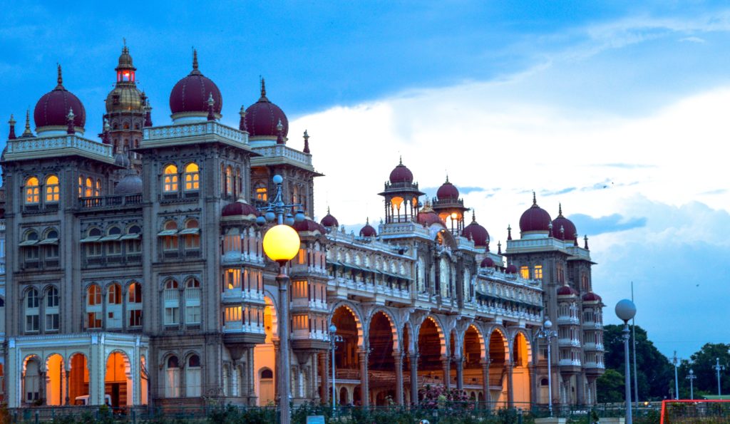Featured in Top 10 Indian Cities of 2023 by Sky Bird Travel & Tours, this image shows a beautiful palace at night.
