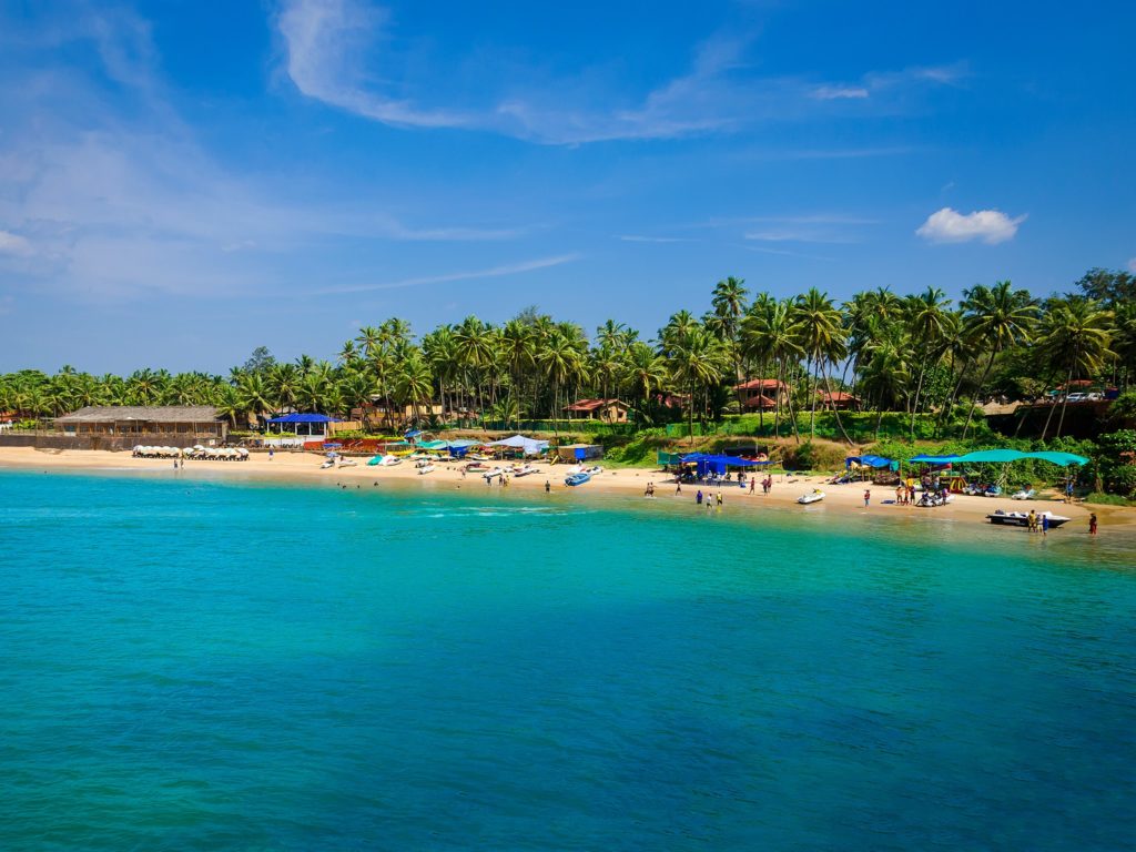 Featured in Top 10 Indian Cities by Sky Bird Travel & Tours, this image shows the beach at Goa, India.