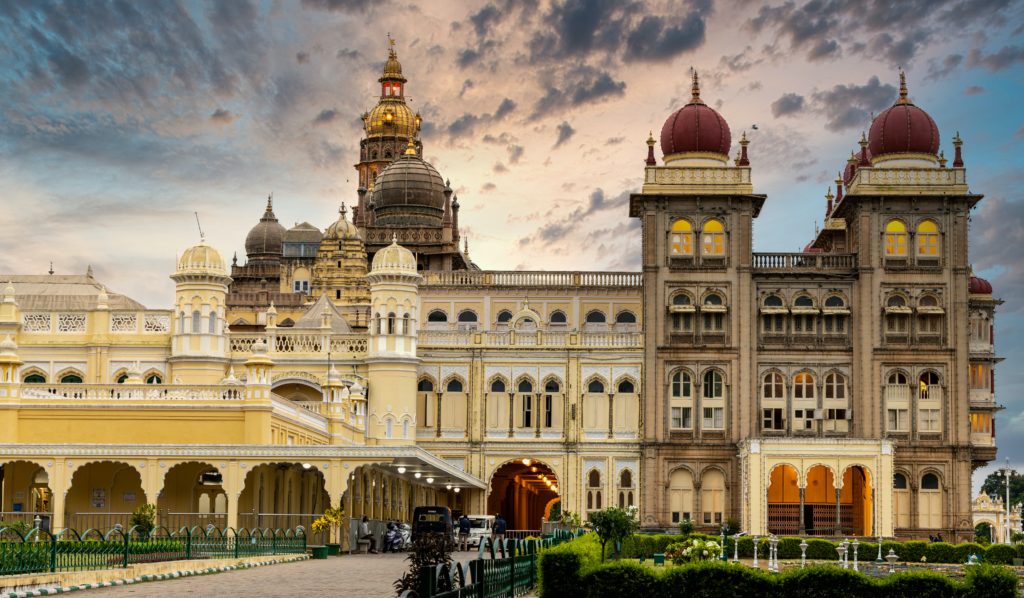 Featured in Top 10 Indian Cities by Sky Bird Travel & Tours, this image shows the palace at Mysore, India.