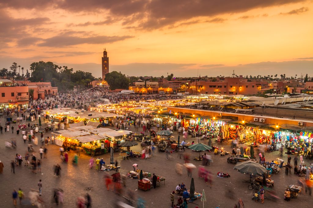 Sky Bird Blog Top 10 Destinations of 2025 Jamaa el Fna market square in sunset, Marrakesh, Morocco, north Africa.