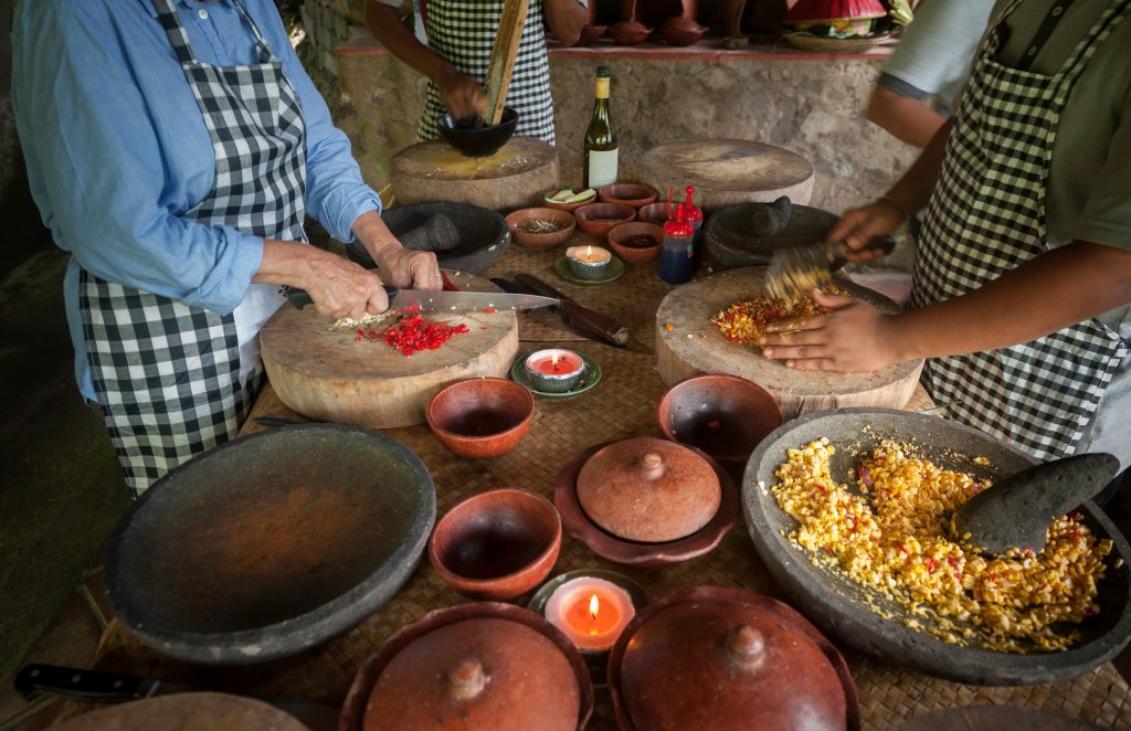 Featured in the blog Trending Travel Experiences of 2025 by Sky Bird Travel & Tours, this image shows a Balinese Cooking Class.